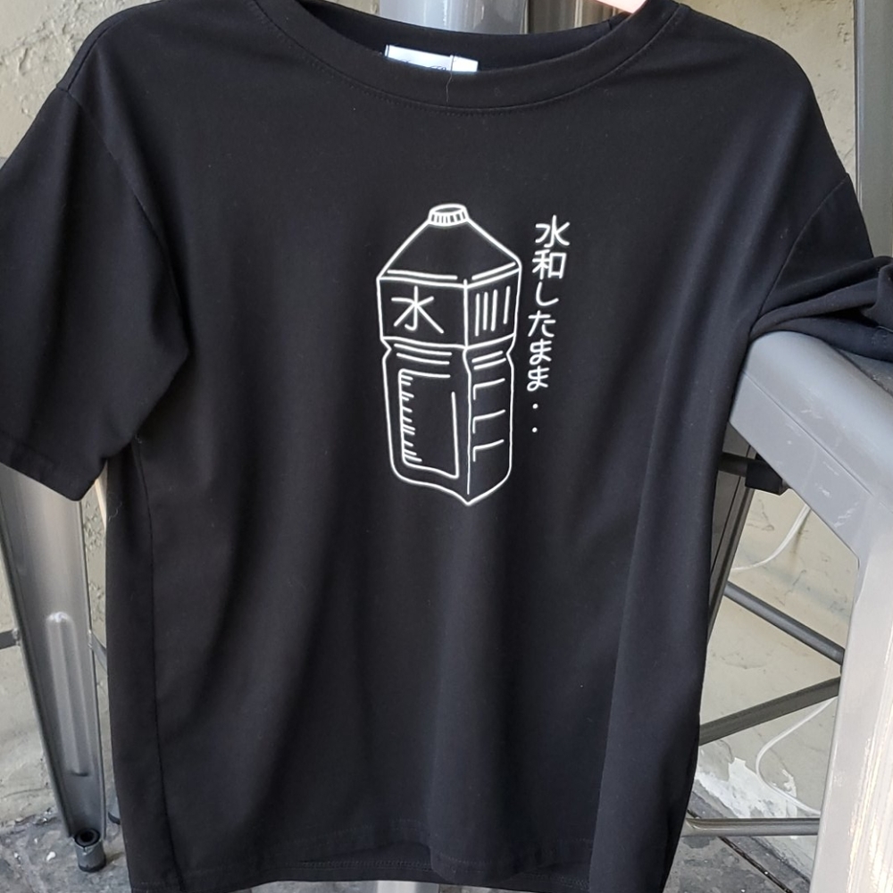 Black Tshirt very cute Never used too small so I'm
